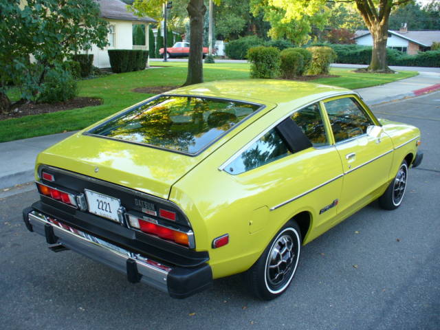 33,00-Mile Datsun B210.